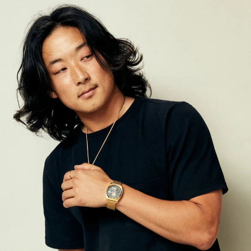 Nixon time tracker sales gold